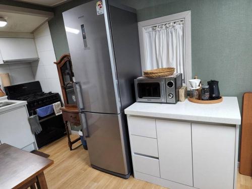 Virtuvė arba virtuvėlė apgyvendinimo įstaigoje Goeunjeong