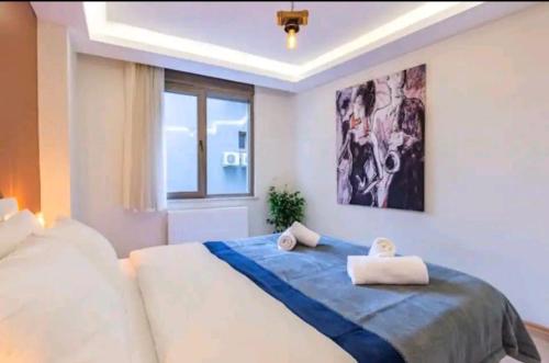 Кровать или кровати в номере Taksim beyoğlu