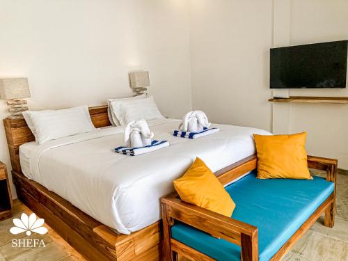 Ένα ή περισσότερα κρεβάτια σε δωμάτιο στο Shefa Private Villa