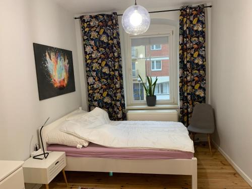 Posteľ alebo postele v izbe v ubytovaní MARGARET apartament w centrum Wrocławia
