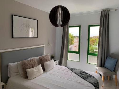 Coqueto apartamento ZUA con piscina