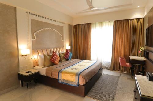Voodi või voodid majutusasutuse juSTa Ssatva Resort, Udaipur toas