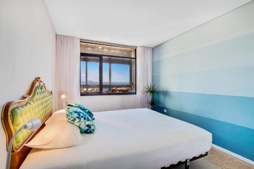 Кровать или кровати в номере Precioso apartamento en La Nogalera - Vista al mar