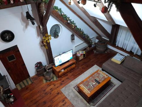 an overhead view of a living room with a flat screen tv at Sibirska Central in Kolašin