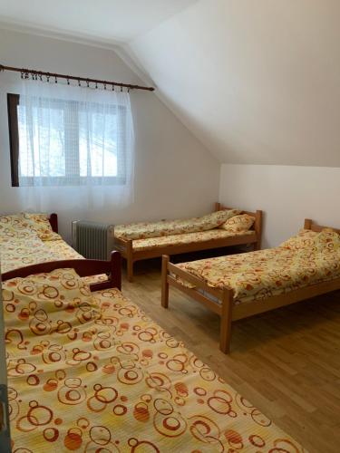 Postel nebo postele na pokoji v ubytování Vila Lane