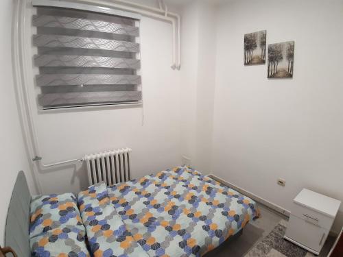 Postel nebo postele na pokoji v ubytování NK Apartman