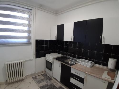 Kuchyň nebo kuchyňský kout v ubytování NK Apartman