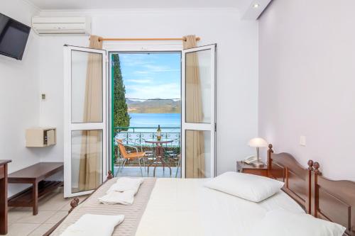 Postel nebo postele na pokoji v ubytování Vergina Star Hotel