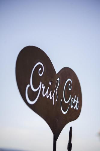a heart shaped cake with the words girls cut at Landhaus Aigner in Allhartsberg