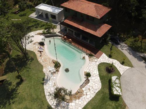Villa Cambuca - Linda casa com piscina e lago perto das mais belas praias do norte de Ubatuba