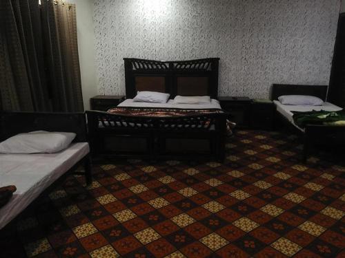 Tempat tidur dalam kamar di Luxury Residency House