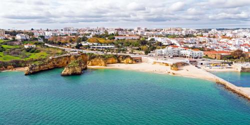 an aerial view of a beach and a city at Rising Sun Apartments in Lagos