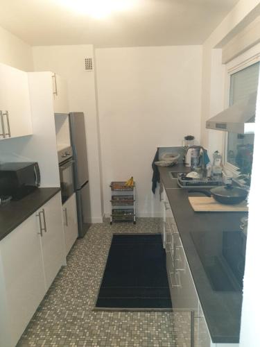 Кухня или мини-кухня в LOVE Appartement partagé avec le proprietaire
