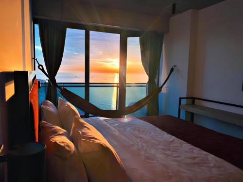 Postel nebo postele na pokoji v ubytování Kartuli Hotel