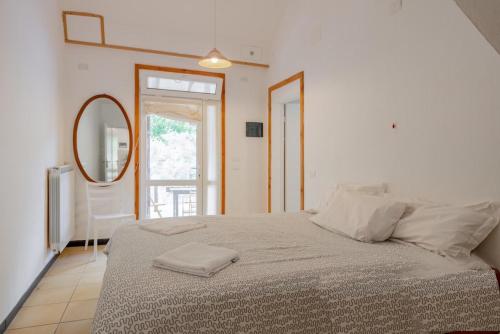 Postel nebo postele na pokoji v ubytování Agriturismo Ca du Chittu