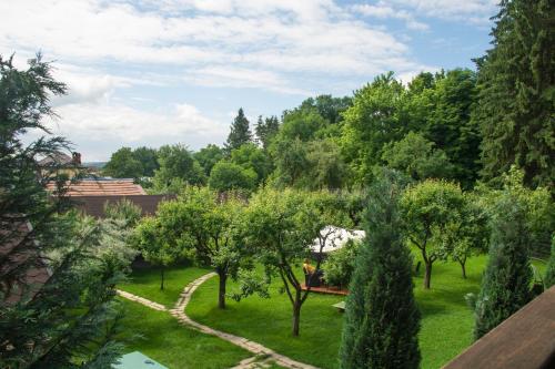 an aerial view of a garden with trees at Pension Andra's House in Horezu