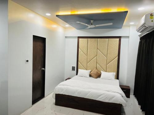 Katil atau katil-katil dalam bilik di Hotel New City Light