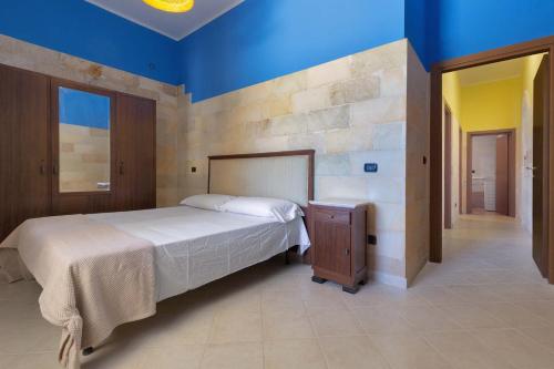 Posteľ alebo postele v izbe v ubytovaní Villetta La Meta by BarbarHouse