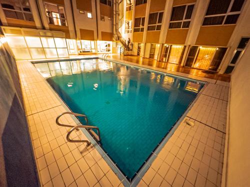 Bazén v ubytování Shaheen Hotel Baghdad nebo v jeho okolí