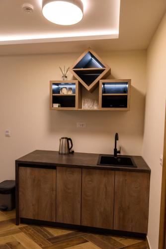 Dapur atau dapur kecil di Perla Lux apartmani
