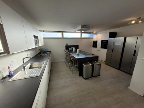 Dapur atau dapur kecil di Guesthouse WI rooms
