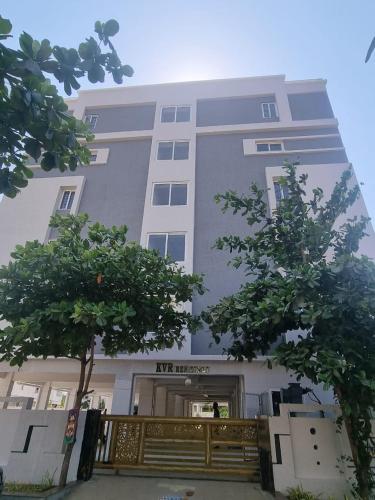 a large building with a gate in front of it at PPH Living KVR Residency in Tada