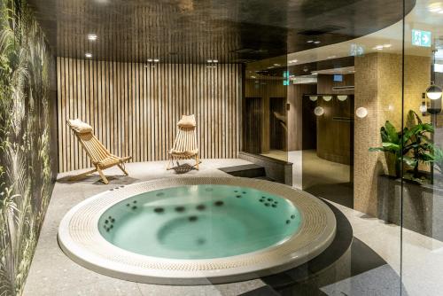 Ванная комната в Hotel Roman Maramures - Ski & Spa Resort
