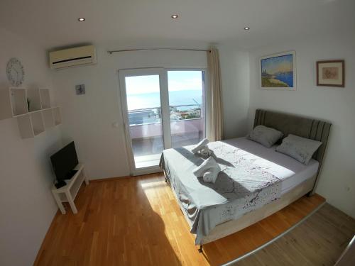 Postel nebo postele na pokoji v ubytování VILLA VIS MARIS
