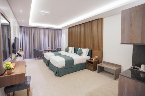 Postel nebo postele na pokoji v ubytování Green View Hotel, Jabal Akhdar
