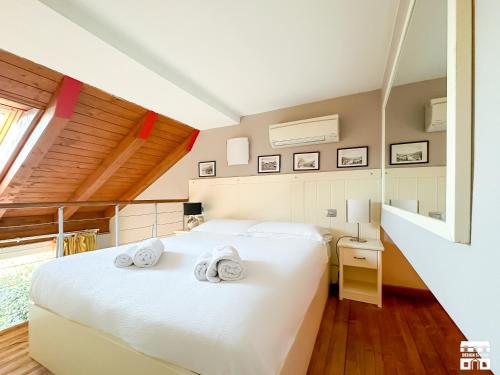 Posteľ alebo postele v izbe v ubytovaní COZY COTTAGE by Design Studio