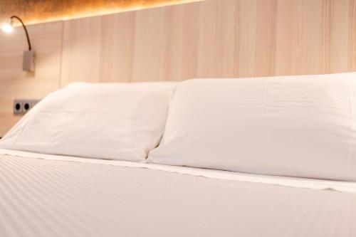 Postel nebo postele na pokoji v ubytování Eurohotel