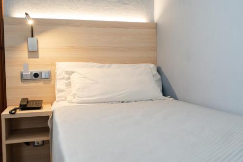 Postel nebo postele na pokoji v ubytování Eurohotel