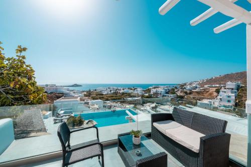 a view from the balcony of a villa at Mr & Mrs White Mykonos in Platis Gialos