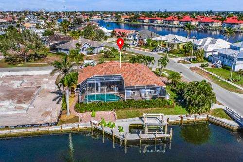 an aerial view of a house on the water at Marco Paradise in Marco Island