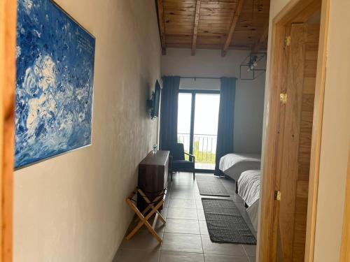 Postel nebo postele na pokoji v ubytování CASA RIVERA DE MORAS
