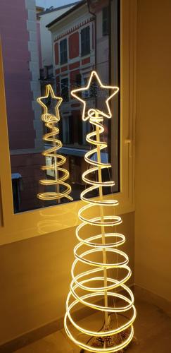 a group of star lights in front of a window at Il Vascello in Rapallo