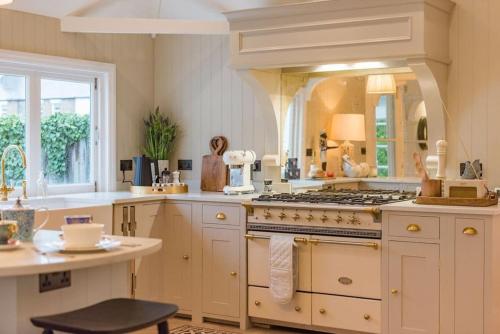 a kitchen with a stove and a counter top at Victory at Cliffe in Kingsdown