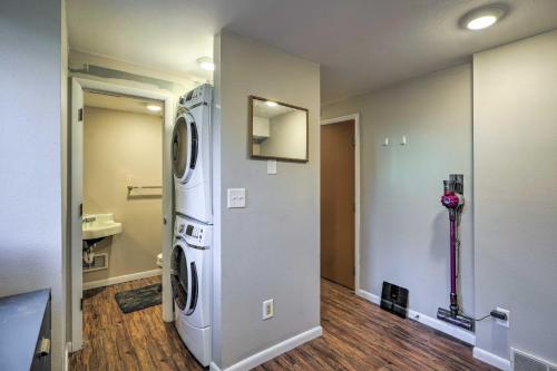 a laundry room with a washer and dryer at Lovely Iowa City Townhome about 3 Mi to Dtwn! in Iowa City