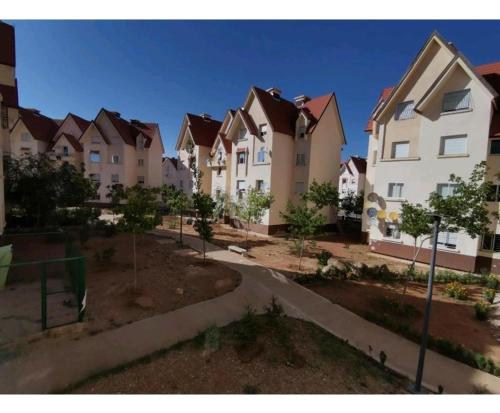 a row of houses in a residential neighborhood at Appartement Au jardin in Ifrane