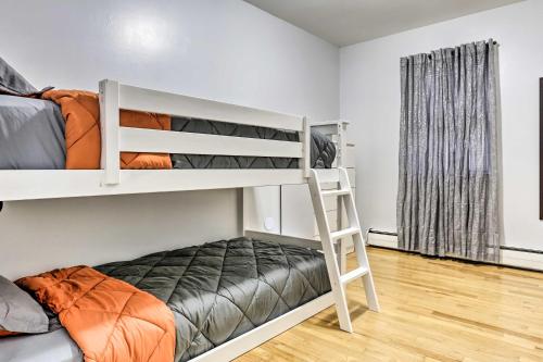 a bedroom with two bunk beds and a window at Ideally Located Jersey City Home, 8 Mi to NYC in Jersey City