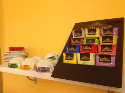 a shelf with a box of marshmallows on it at Garni Villa Betty in Merano