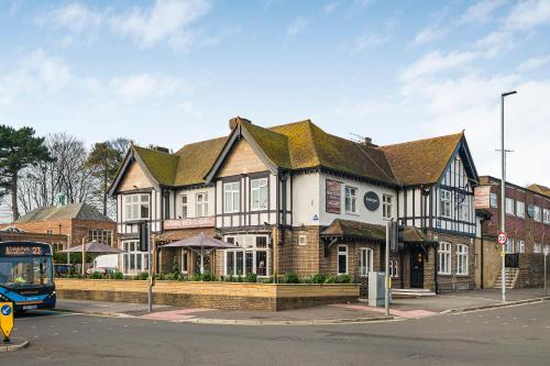 a large house on the corner of a street at The Red Lion by Innkeeper's Collection in Portsmouth