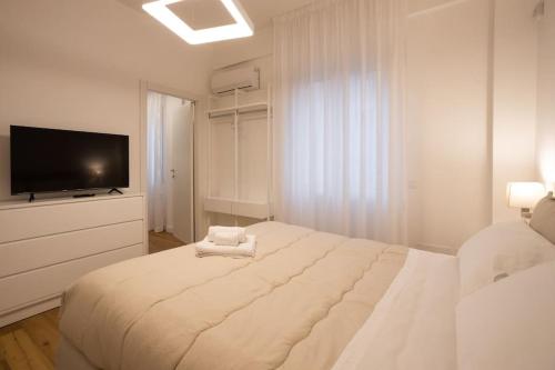 Ένα ή περισσότερα κρεβάτια σε δωμάτιο στο Luxury Libertà