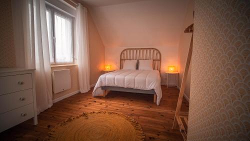 Postel nebo postele na pokoji v ubytování TY HOLEN