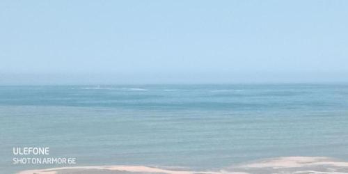 a view of the ocean from a beach at Bellavista in Lima