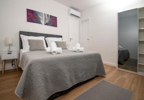 Posteľ alebo postele v izbe v ubytovaní Villa Godimento