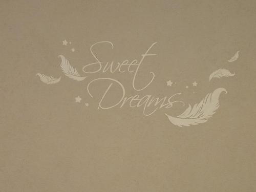 a sign that reads sweet dreams with white wings at Fewo M & M in Scharnitz