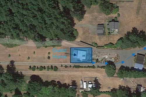 an aerial view of a home with a street estate at Beautiful Oceanview Retreat 2 Bedroom Home in Port Hadlock