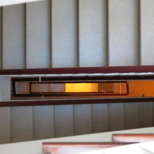 an orange object is sitting on a shelf at Evora Inn in Évora