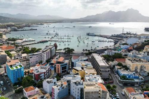 an aerial view of a city with boats in the water at Lovely Apartment In Mindelo City Center in Mindelo